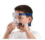 Boy in ResMed Micro for Kids nasal mask